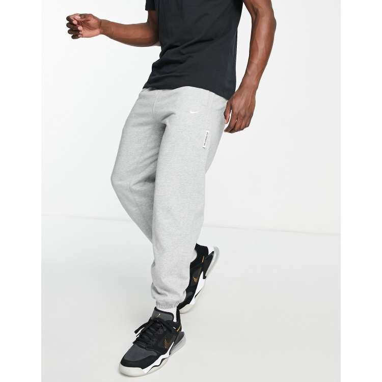 Nike joggers standard on sale fit