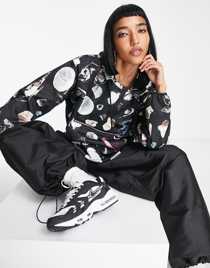 Nike Basketball Standard Issue Dri-FIT seasonal gem AOP hoodie in black