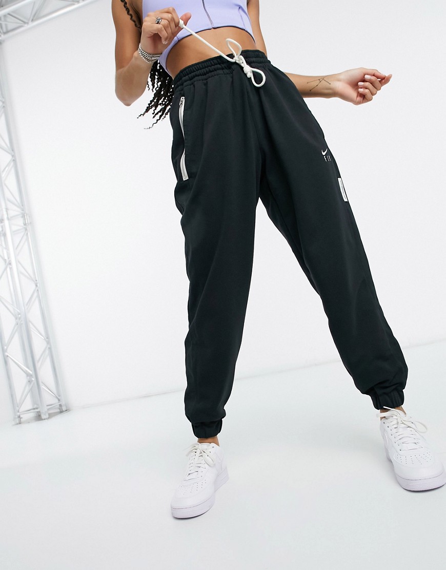 Nike Basketball standard issue fly logo joggers in black