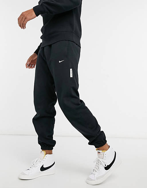Tracksuits Nike Basketball standard issue joggers in black 