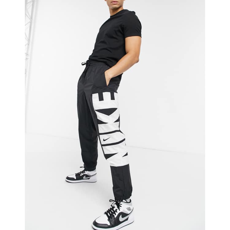 Nike big logo on sale joggers