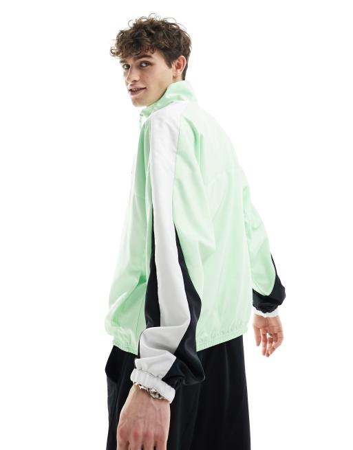 Nike Basketball Starting 5 woven jacket in green | ASOS