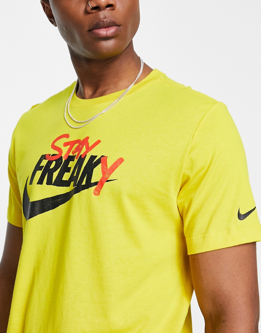 Nike Basketball Stay Freaky printed t-shirt in yellow