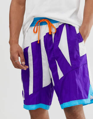 purple and white nike shorts