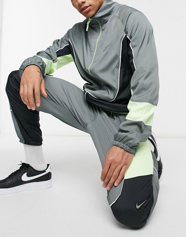 Nike Basketball throwback track pants in gray and volt