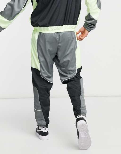 Nike Basketball throwback track pants in gray and volt