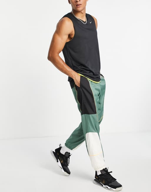 Nike Basketball Throwback track pants in green