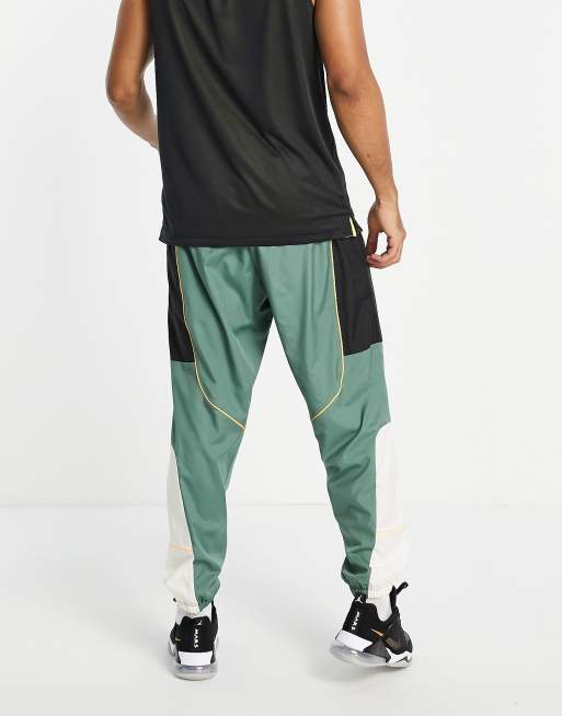 Nike Basketball Throwback track pants in green