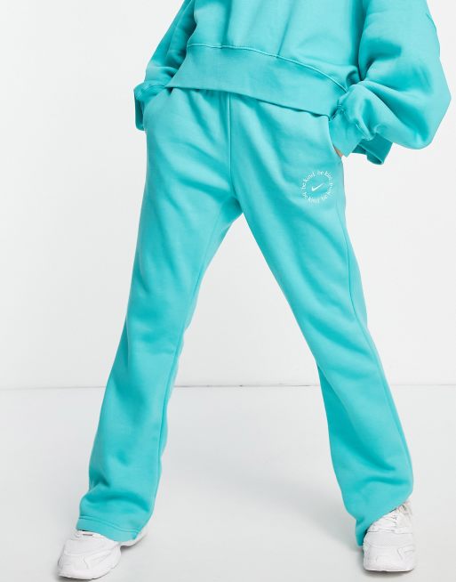 Nike Be Kind flared fleece joggers in teal