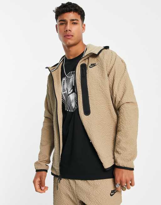 Nike – Beige strukturvävd jacka i tech-fleece med dragkedja
