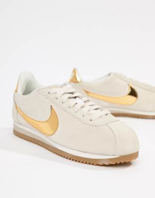 nike gold suede