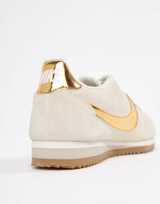 nike taupe with gold swoosh suede cortez trainers