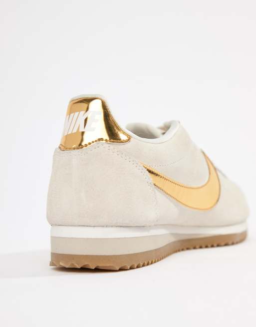 Nike cortez cheap womens gold swoosh