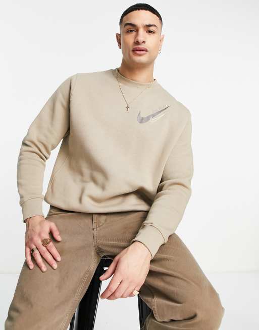 Nike – Beigefärgad sweatshirt med logga på bröstet