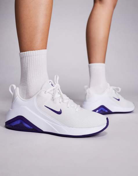 Nike Bella 7 sneakers in white & purple - view 1
