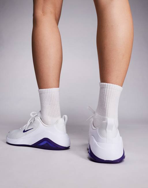 Nike Bella 7 sneakers in white & purple | ASOS