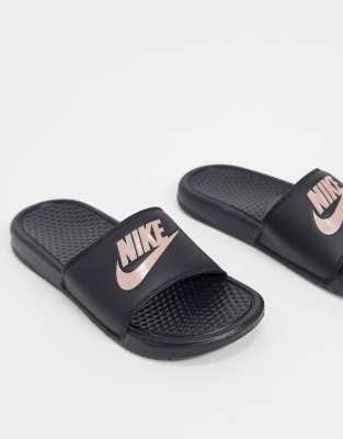 black and rose gold nike sliders