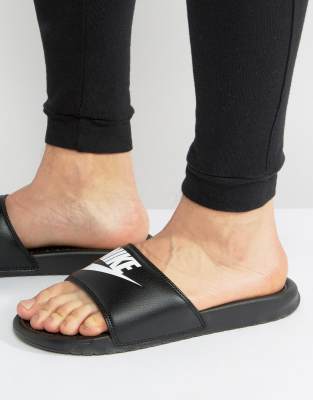 nike benassi slides on feet