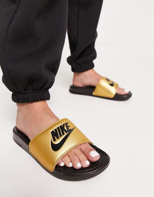 Black and gold nike sliders sale