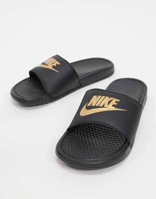 black and gold nike sliders