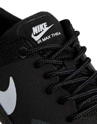 nike black thea trainers