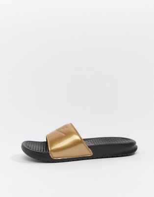 nike black and gold sliders