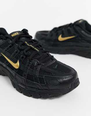 nike black gold shoes