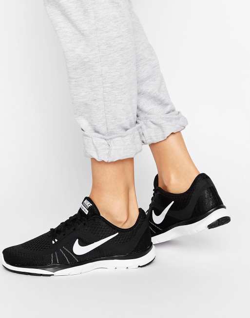 Nike black trainers shop with white sole