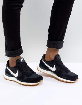 nike black and gold internationalist sneakers