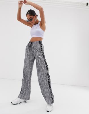 nike wide leg popper trousers ladies