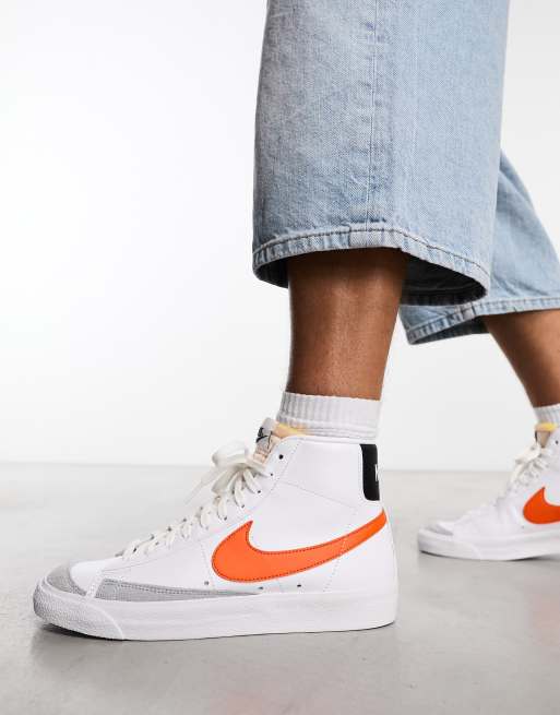 White and orange 2024 nike high tops