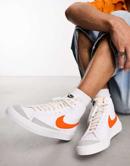 Nike Blazer 77 Mid sneakers in white and orange