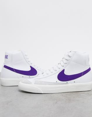 white and purple trainers