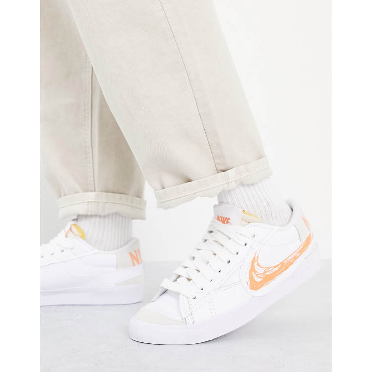 Nike Blazer Low 77 Jumbo trainers with scribble swoosh in white