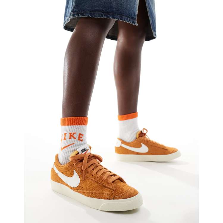 Nike Blazer Low 77 sneakers in tan and white ASOS