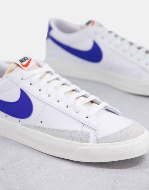 Nike Blazer Low 77 trainers in white and blue