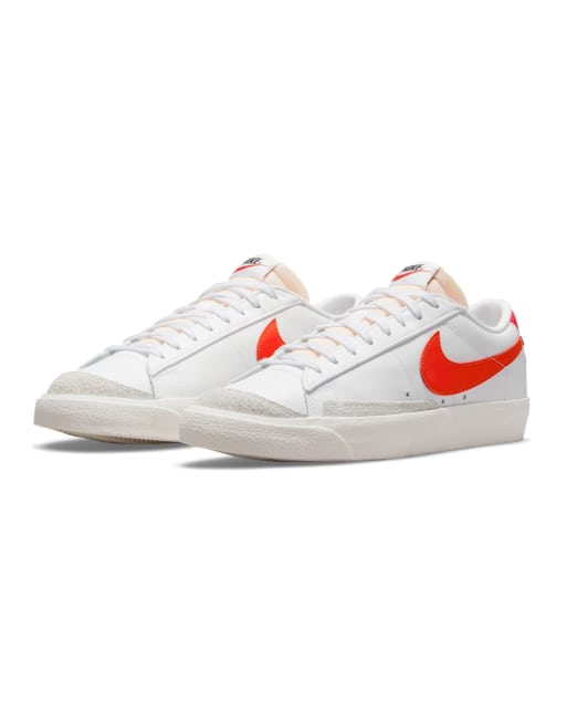 Nike Blazer Low '77 VNTG sneakers in white/team orange