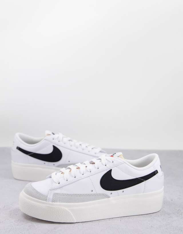 Nike Blazer Low Platform sneakers in white and black