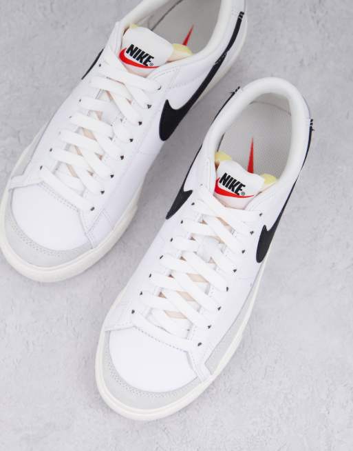 Nike Blazer Low Platform sneakers in white and black