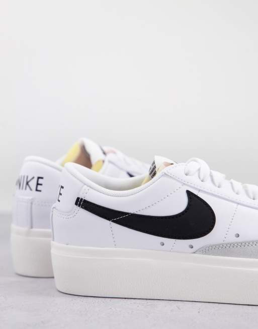 Black and white store platform nikes