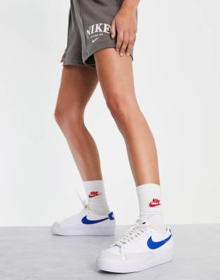 NIKE BLAZER LOW PLATFORM SNEAKERS IN WHITE AND BLUE