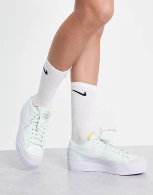 Nike Blazer Low Platform trainers in barely green - ASOS Price Checker