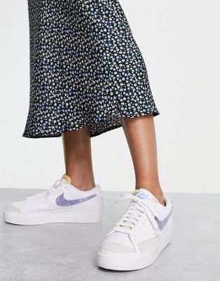 Nike Blazer Low Platform trainers in white and snake print