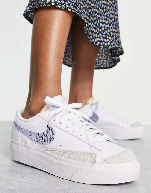 Nike Blazer Low Platform trainers in white and snake print