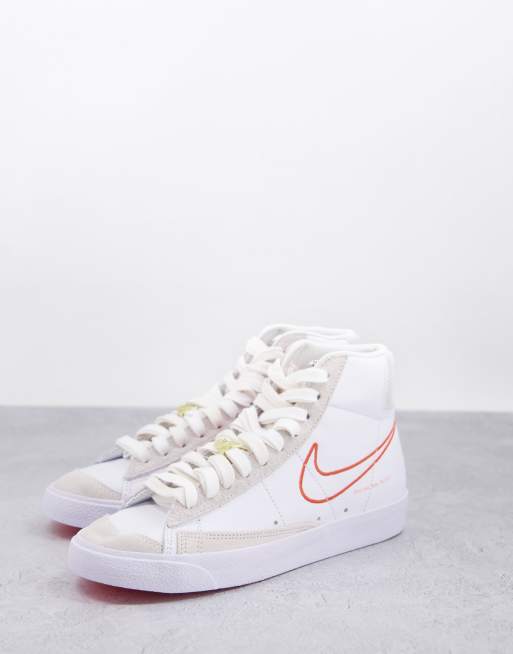 Nike Blazer Mid '77 SE S50 sneakers in white/orange | ASOS