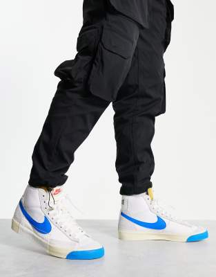 Nike Blazer Mid ’77 trainers in white and blue