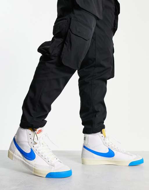 Nike Blazer Mid 77 trainers in white and blue