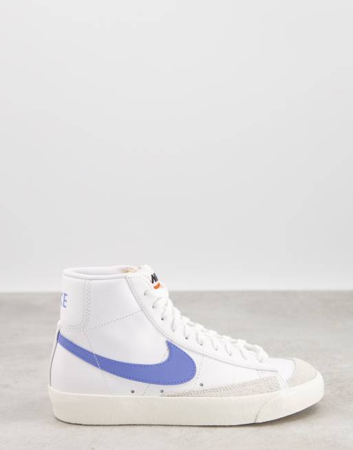 Nike Blazer Mid 77 trainers in white and blue