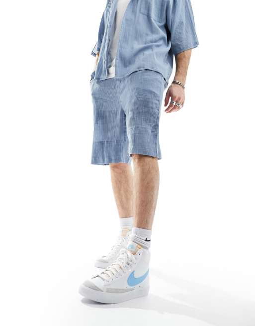 Nike Blazer Mid '77 Vintage sneakers in white and blue ASOS