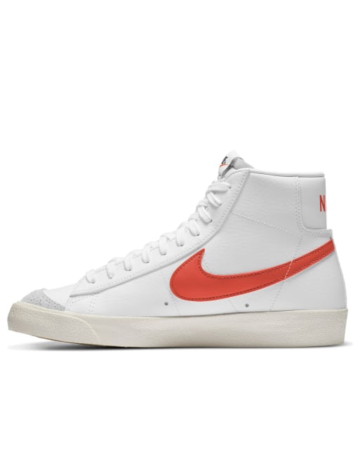 Nike Blazer Mid '77 VNTG sneakers in white and orange | ASOS